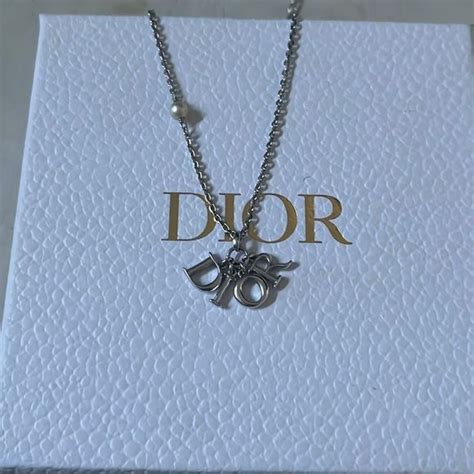 dior revolution necklace pearl|christian Dior charm station necklace.